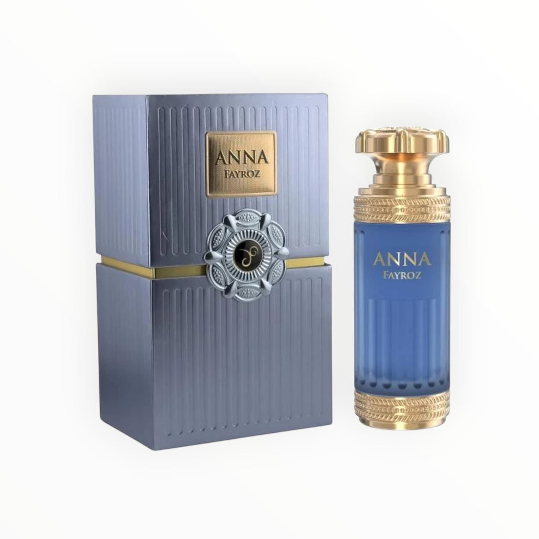 Rimaal Anna Fayroz Eau de Parfum in einem eleganten blauen Flakon mit goldenen Details neben der passenden Geschenkbox