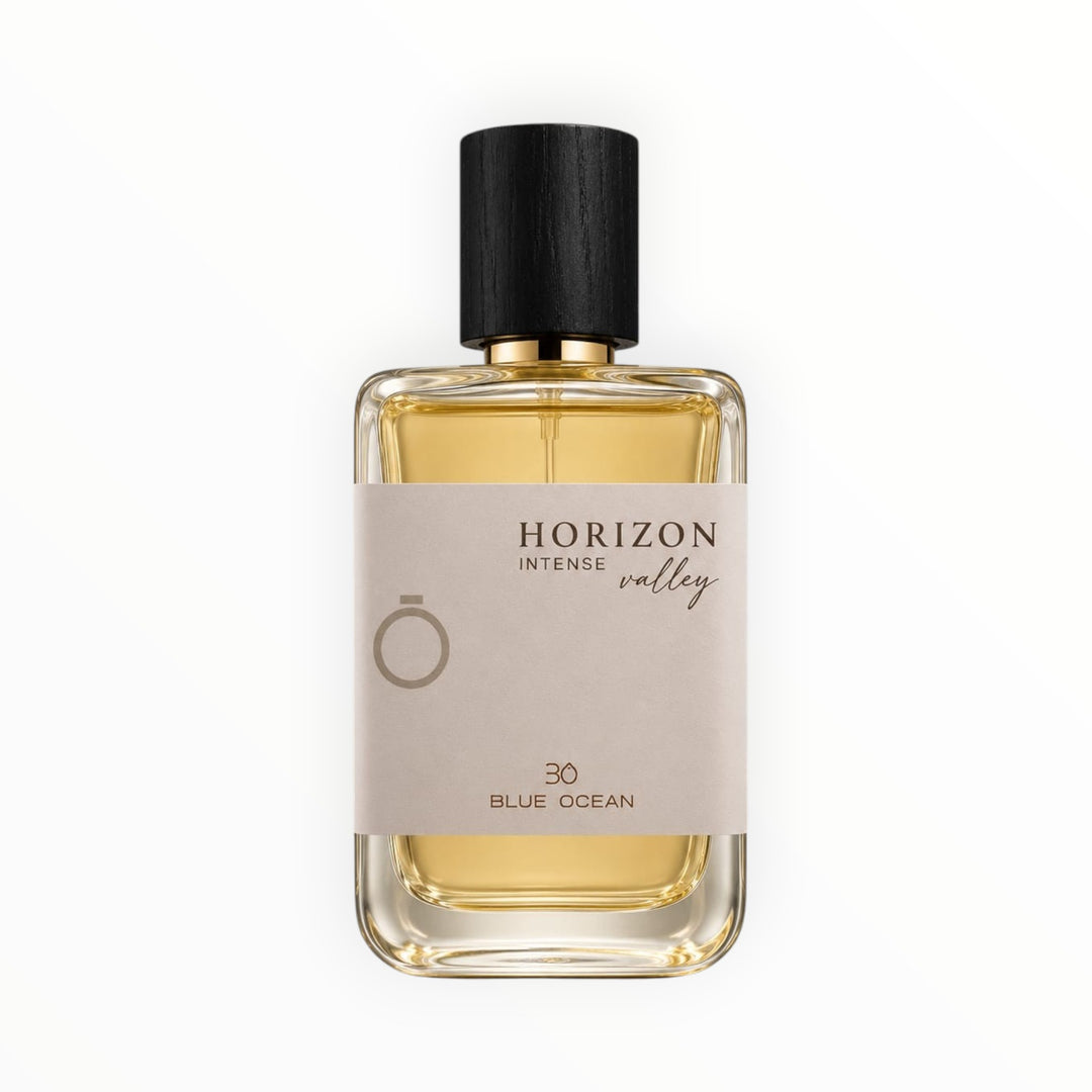 Rimaal Blue Ocean Valley Intense Eau de Parfum 100ml in einem eleganten Glasflakon mit schwarzem Holzdeckel.