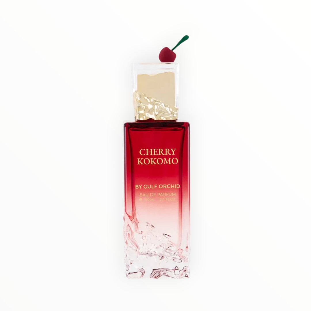 Rimaal Gulf Orchid Cherry Kokomo Eau de Parfum 100ml in einem roten Glasflakon mit goldenem Verschluss und Kirsch-Deko