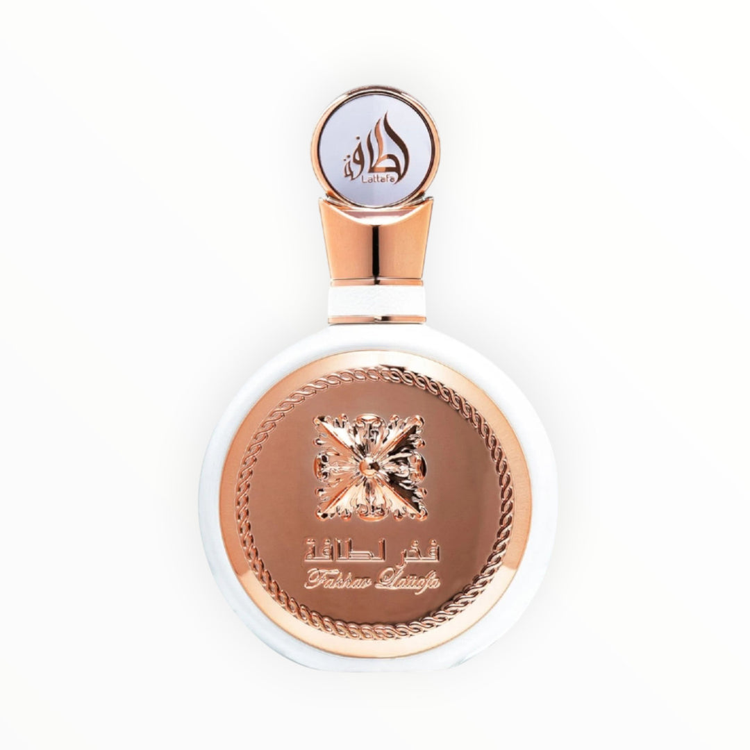Rimaal Lattafa Fakhar Women Eau de Parfum in einer eleganten weißen Flasche mit roségoldenen Akzenten und Emblem.