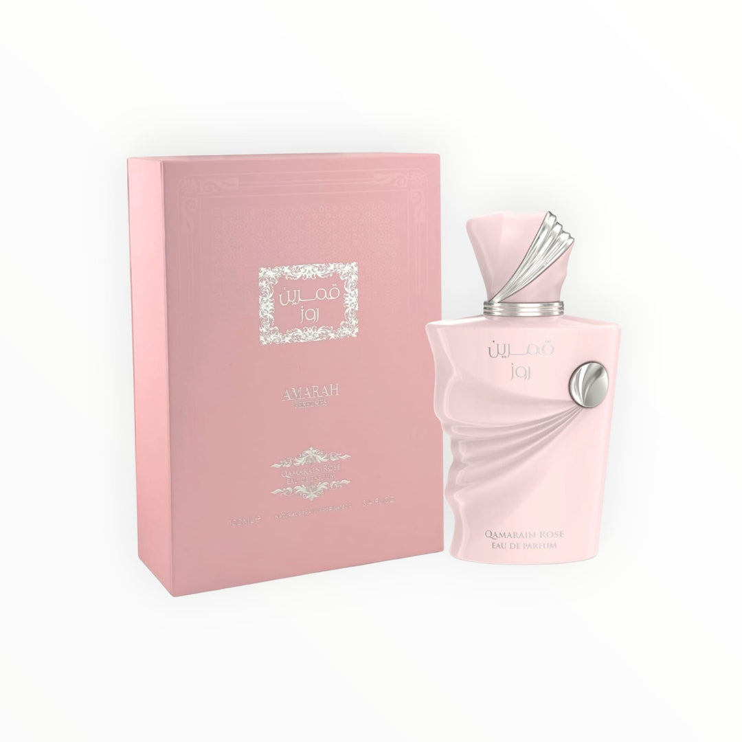 Rimaal Qamareen Rose Eau de Parfum 100ml in einem eleganten, hellrosa Flakon mit passender Geschenkverpackung.